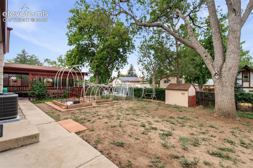 Image 26 of 30: Planter Boxes, Storage Shed, Lots Of Privacy.
