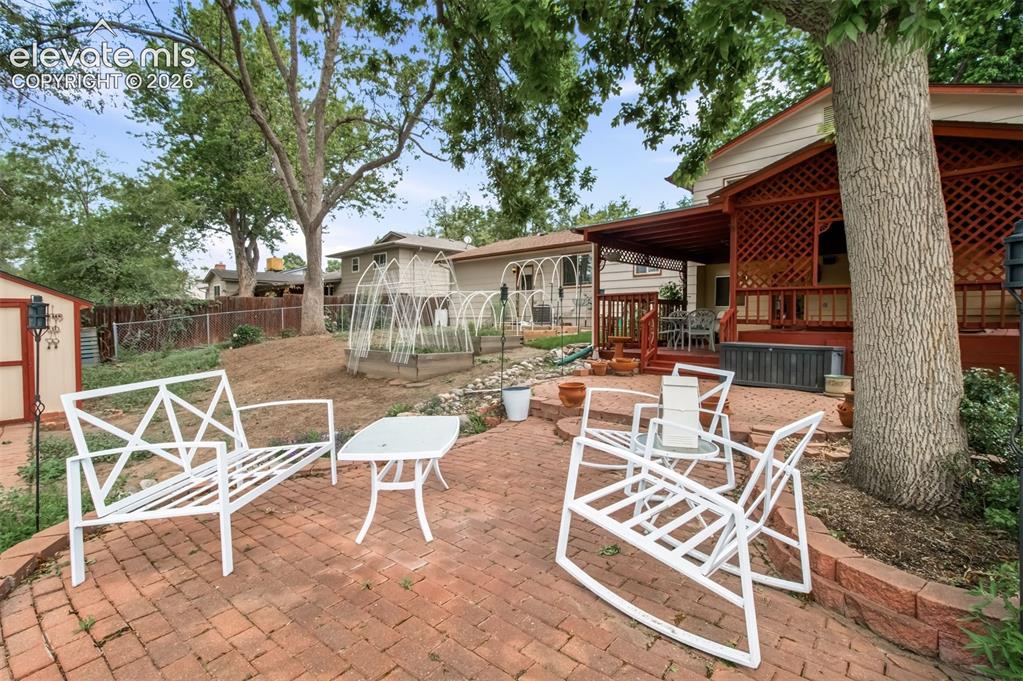 Image 3 of 30: Fully Fenced Backyard, Private Patio, Planter Boxes