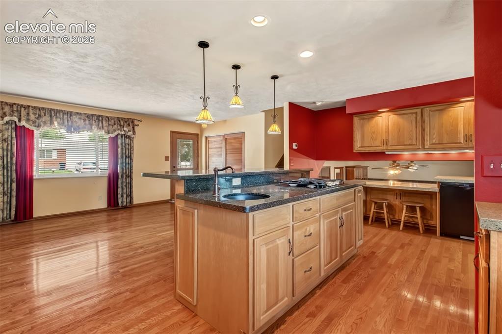 Image 6 of 30: Gas Cooktop With Downdraft, Salad Sink.