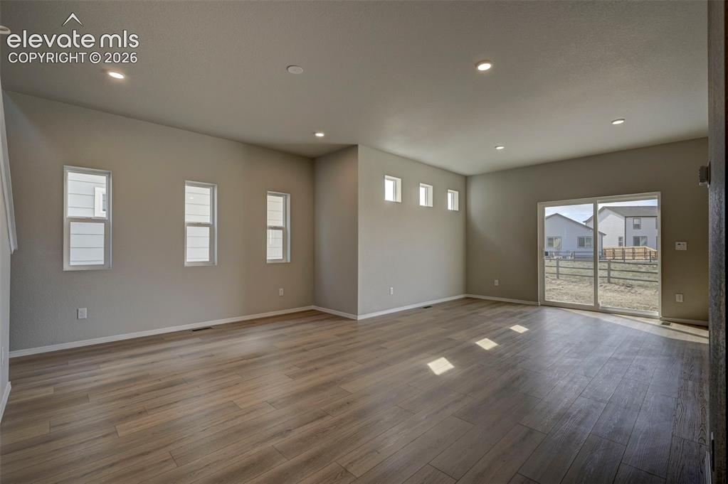 Image 12 of 27: living and dining area - Grand Living Space