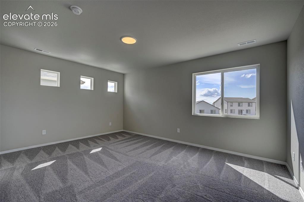 Image 22 of 27: Master Bedroom