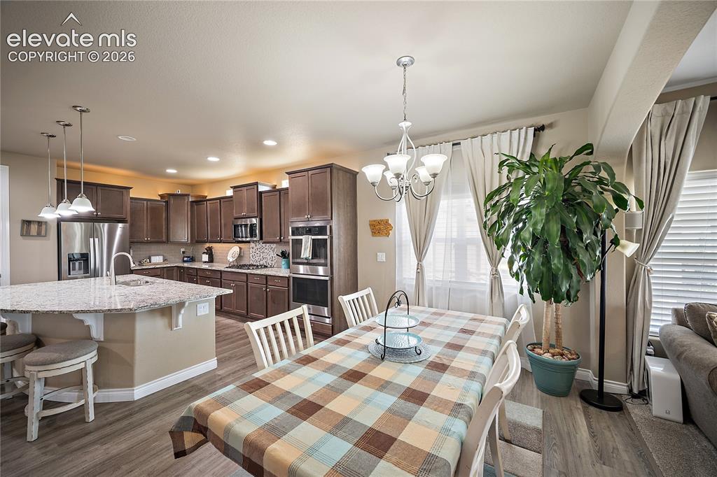 Image 11 of 49: Dining space is perfectly situated for seamless entertaining.