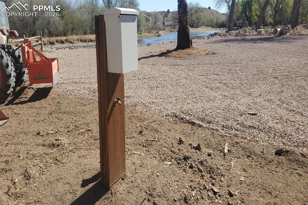Image 10 of 27: Two additional exterior RV hook-ups are located on the other side of the lo