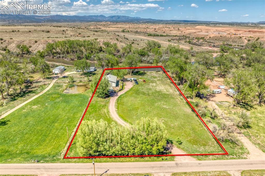 Image 25 of 27: Property lines are approximate and not a survey.