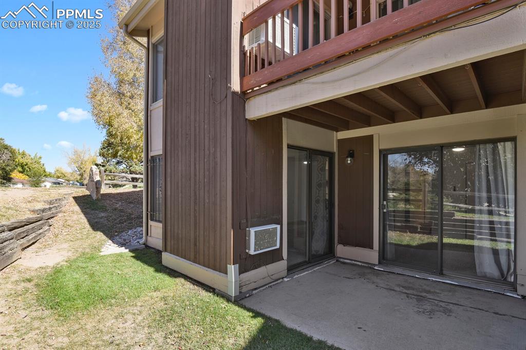 Image 17 of 17: View of exterior entry featuring a patio area