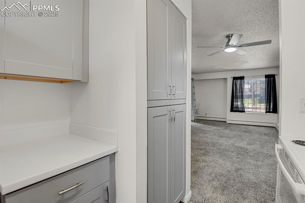 Image 8 of 17: Kitchen featuring upgraded cabinetry and appliances