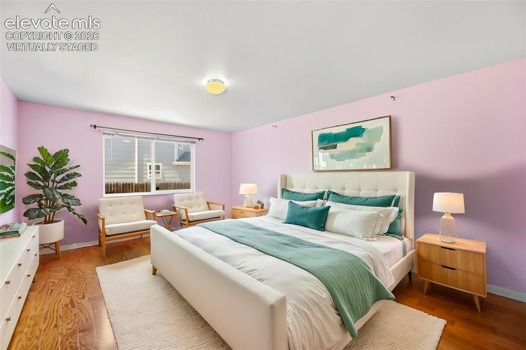 Image 16 of 50: Virtually staged primary bedroom