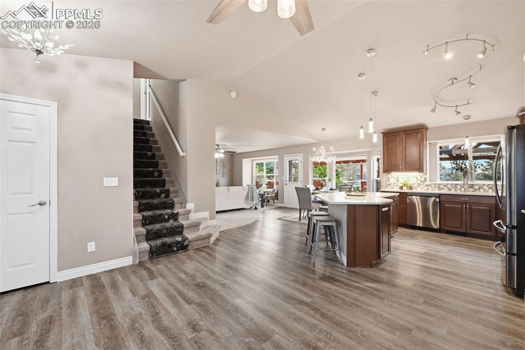 Image 2 of 50: As you step inside this home, the openness greets you. Bright & cheery.