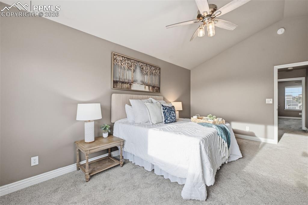 Image 21 of 50: A good sized primary bedroom on the 2nd floor. Vaulted ceilings makes it fe