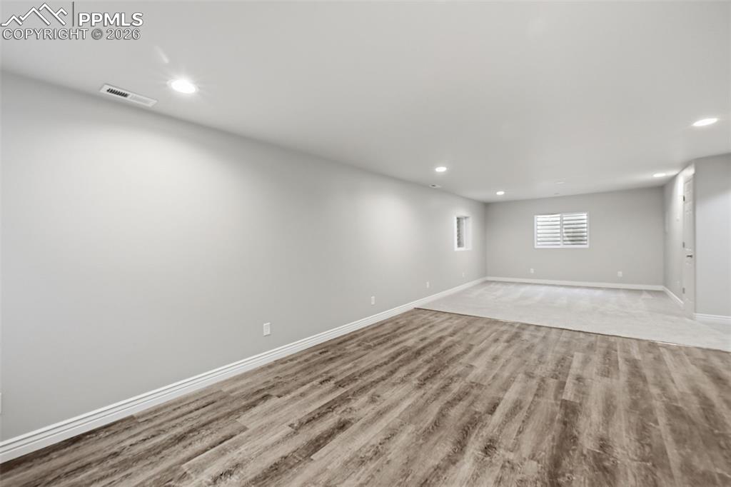 Image 32 of 50: Another view of the spacious room in the basement. If you wanted another be