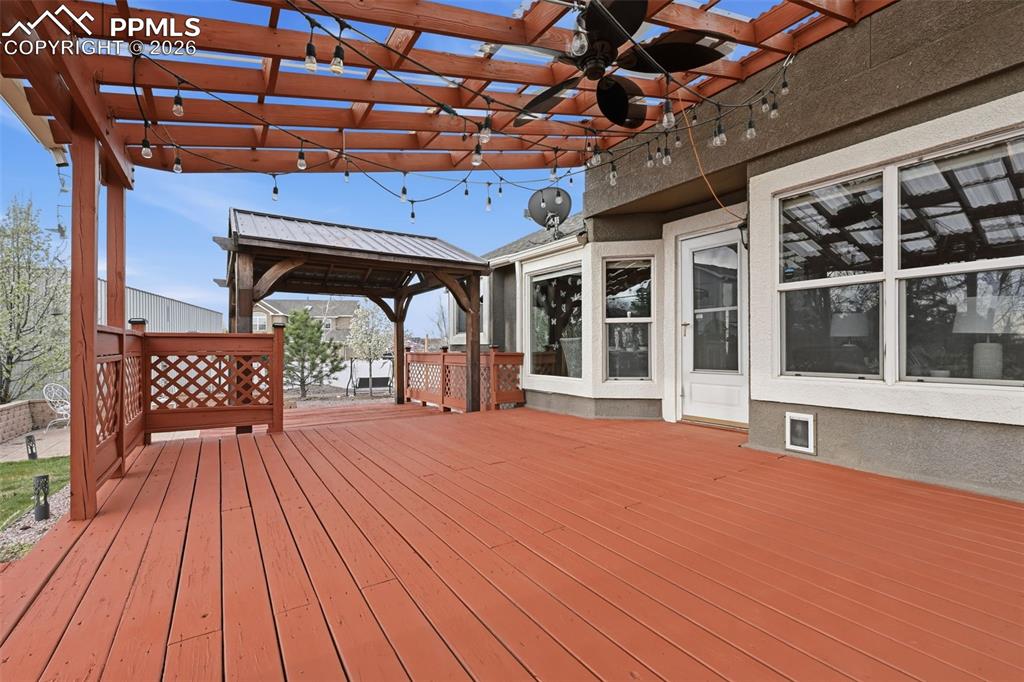 Image 37 of 50: The other side of the deck has a gazebo over it. So much room for entertain