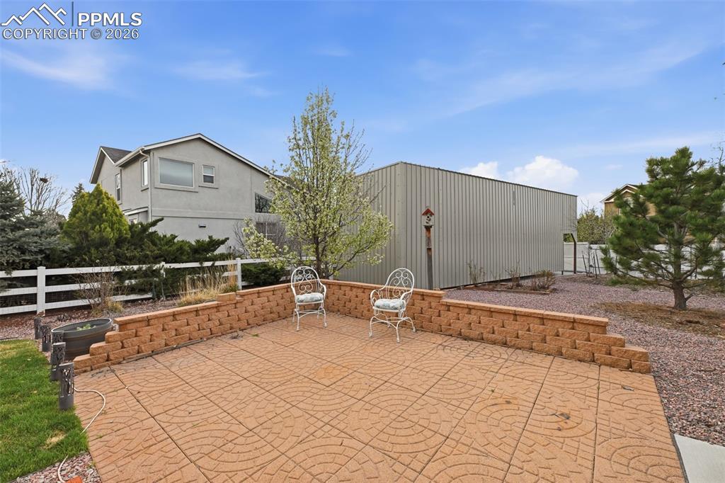 Image 39 of 50: An extension of the entertaining area in the backyard. So many places to en