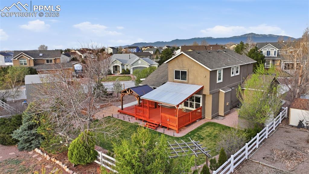 Image 45 of 50: Imagine the entertaining or just quiet times in your backyard. An oasis for