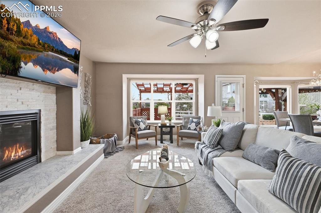 Image 7 of 50: Another view of the family room as your looking out to the backyard. There