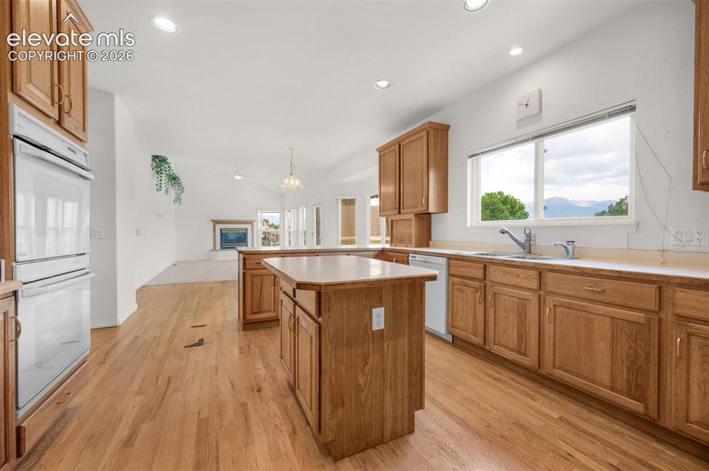 Image 12 of 48: Kitchen Showing the Adjoining Family Room