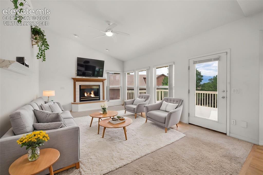 Image 15 of 48: Virtually Staged...
Family Room Featuring Gas Log Fireplace, Vaulted Ceili