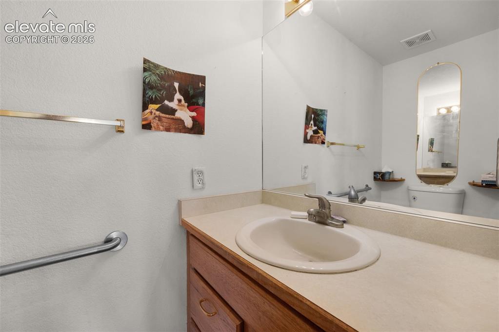 Image 21 of 48: Main Level Half Bathroom