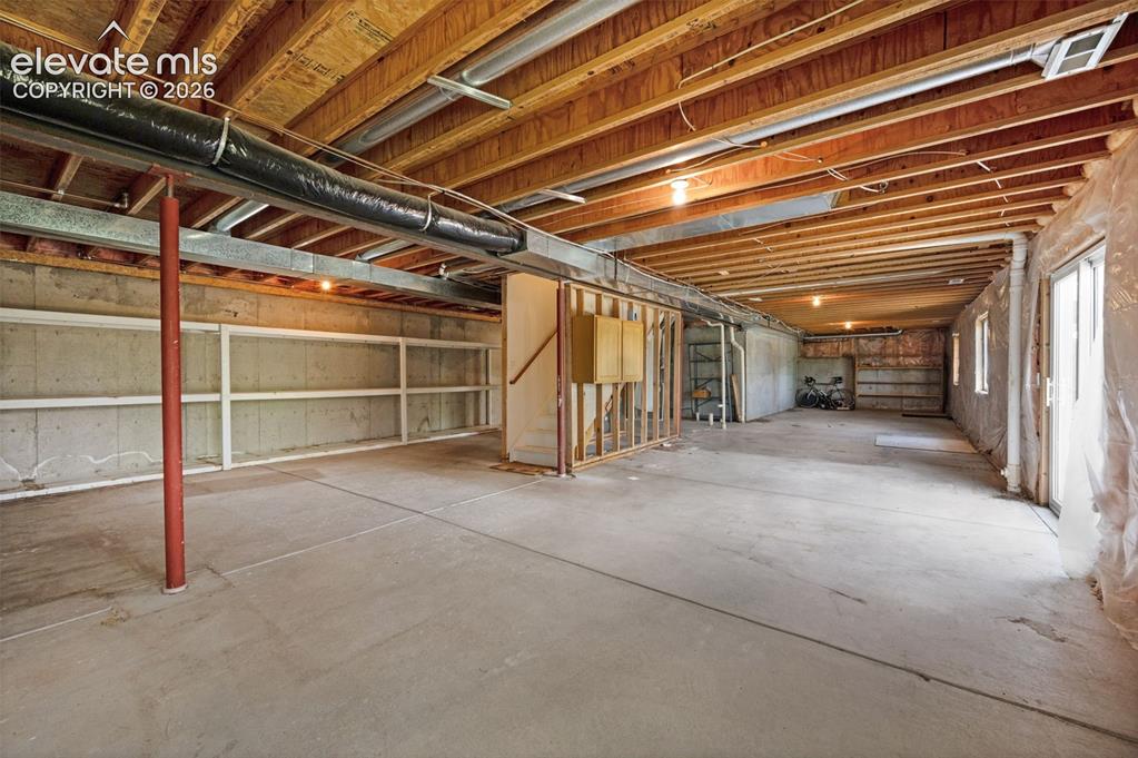 Image 37 of 48: Unfinished Walk-out Basement