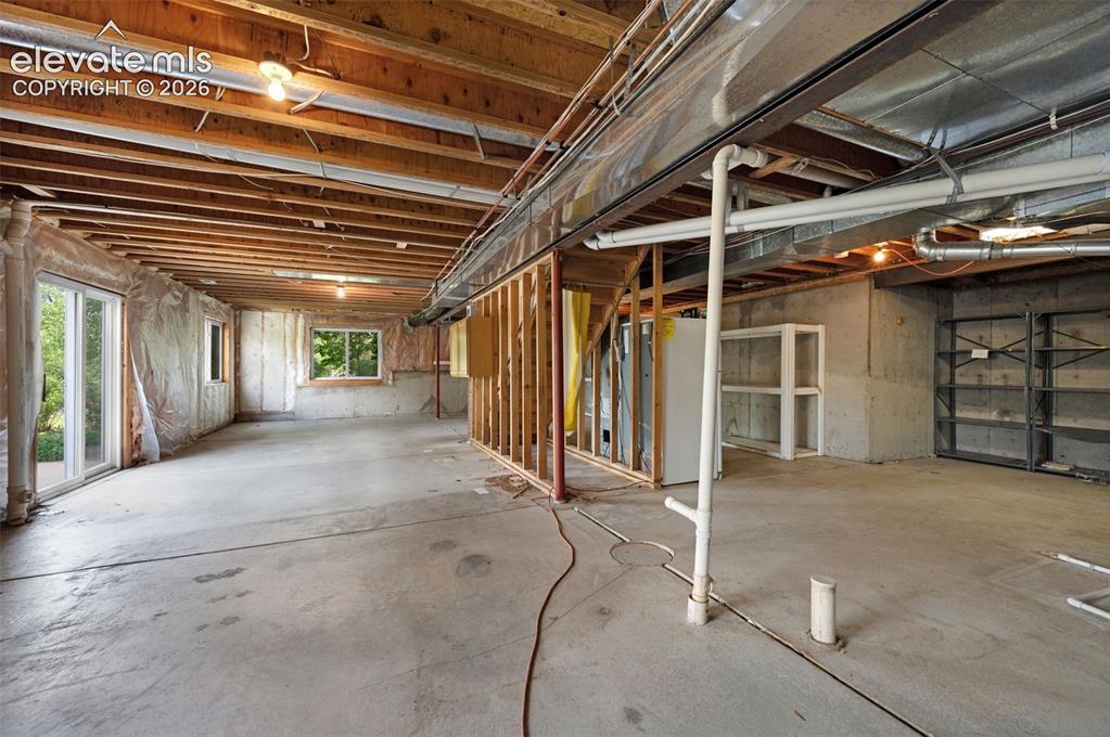 Image 38 of 48: Unfinished Walk-out Basement