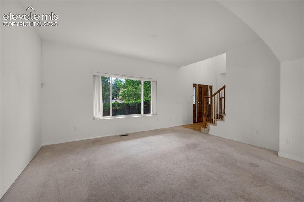 Image 8 of 48: Living Room as Viewed from the Dining Room
