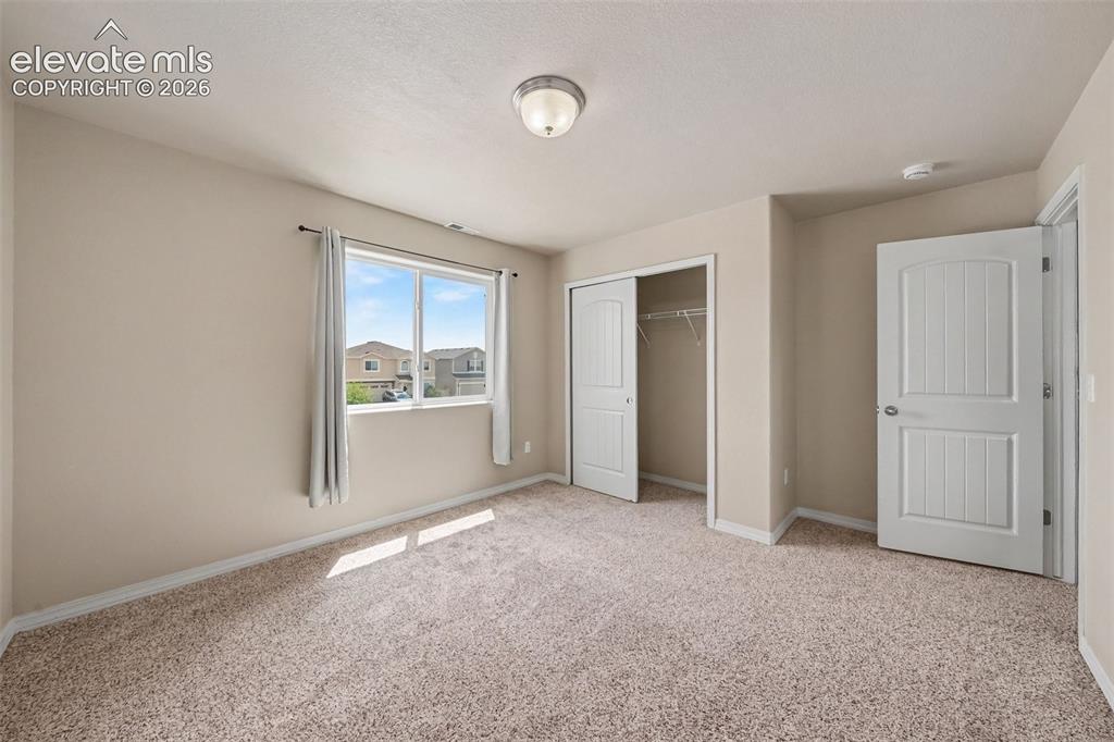 Image 16 of 25: Bedroom