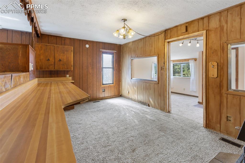 Image 11 of 41: Family room opens to kitchen and gives a big room feel. 