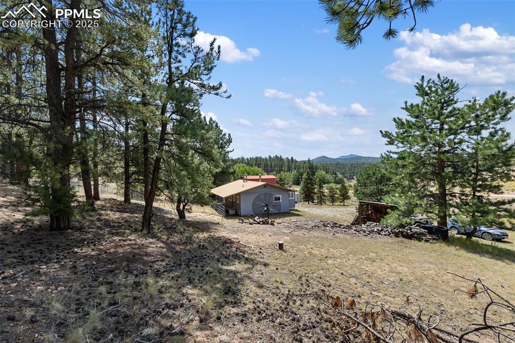 Image 3 of 41: Colorado Mountain Cabin on one acre. Mountain views, tress, meadows, lakes 