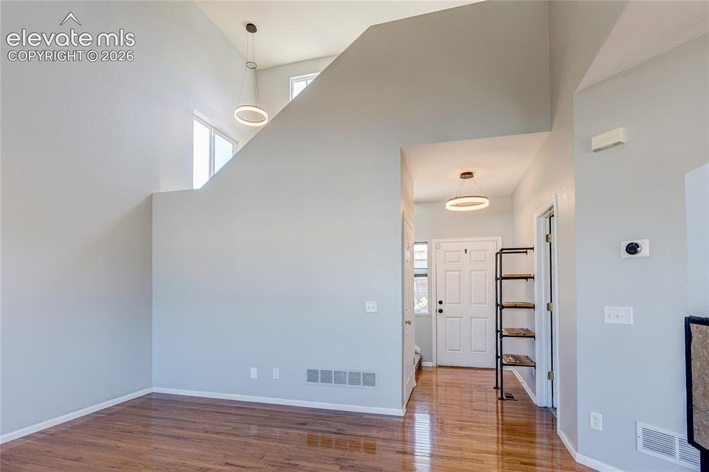 Image 3 of 42: Wood floors throughout main level.