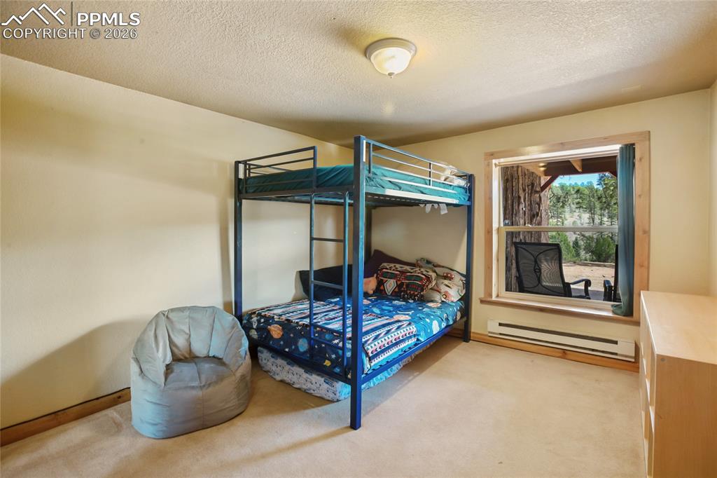 Image 19 of 34: Downstairs Bedroom