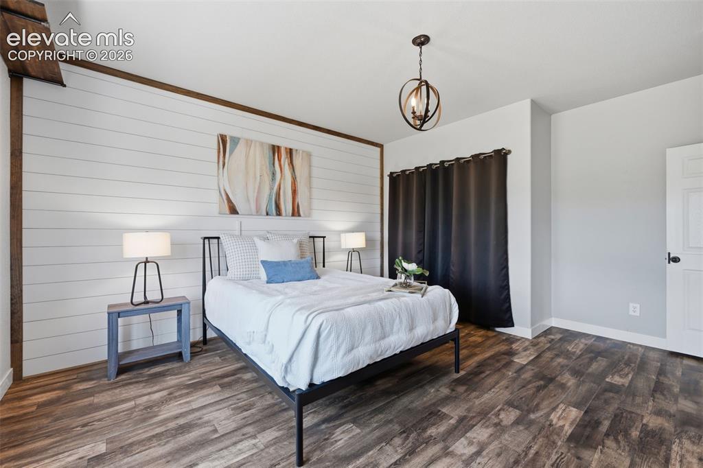 Image 21 of 49: Another view of the spacious main level bedroom!
