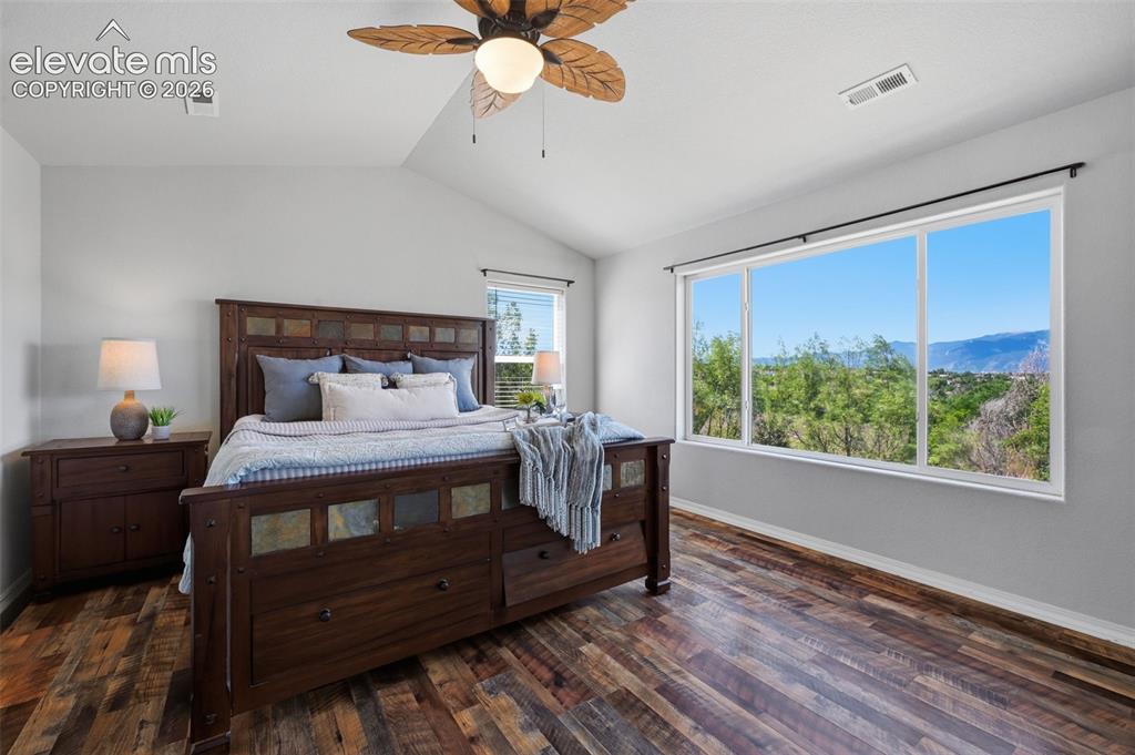Image 23 of 49: Huge master bedroom with endless views and vaulted ceiling!