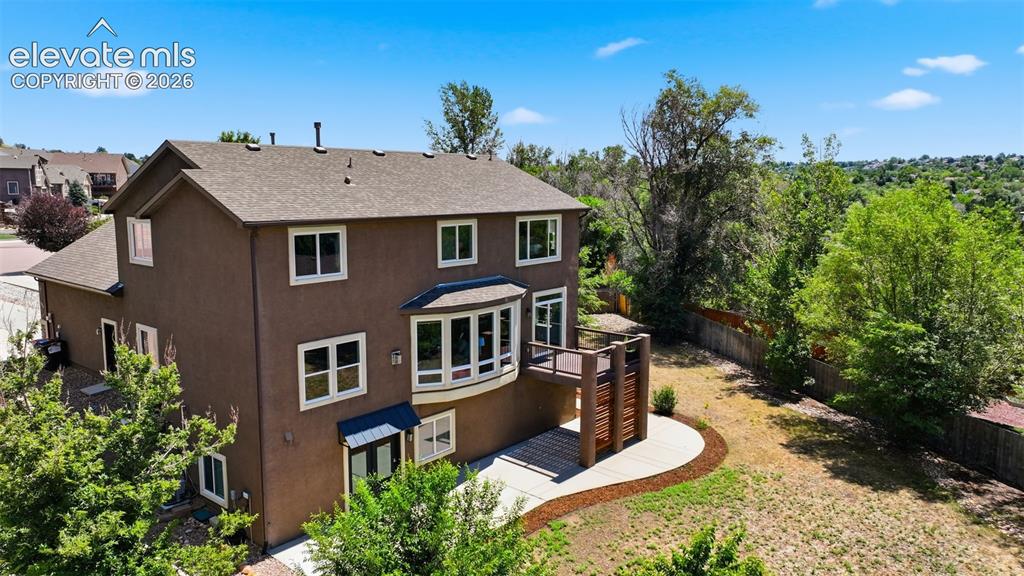Image 48 of 49: Wonderful private back yard with extended patio and hot tub prewire!