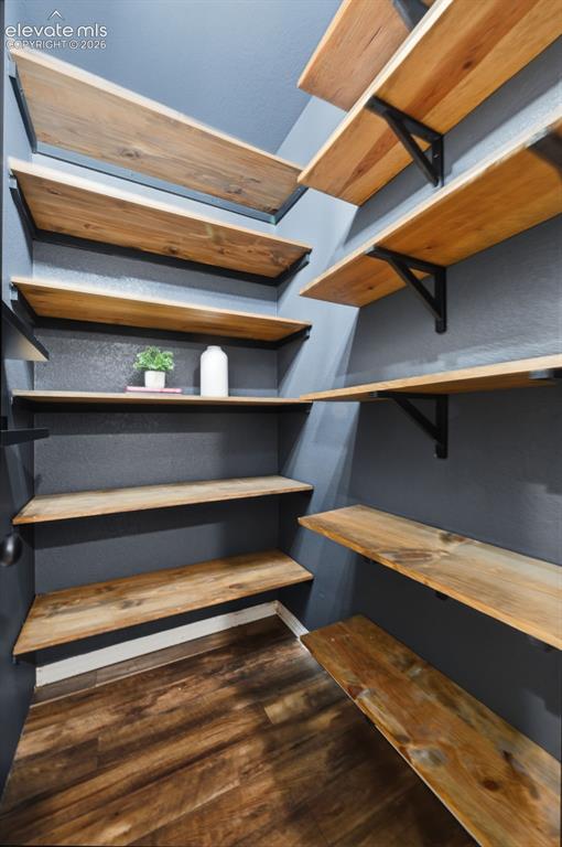 Image 9 of 49: Large walk in pantry  with more charm!