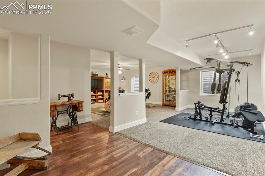 Image 26 of 43: Basement Flex Space with overhead track lighting!