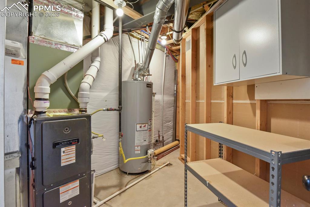 Image 35 of 43: NEW WATER HEATER 2025!  Lots of storage space!