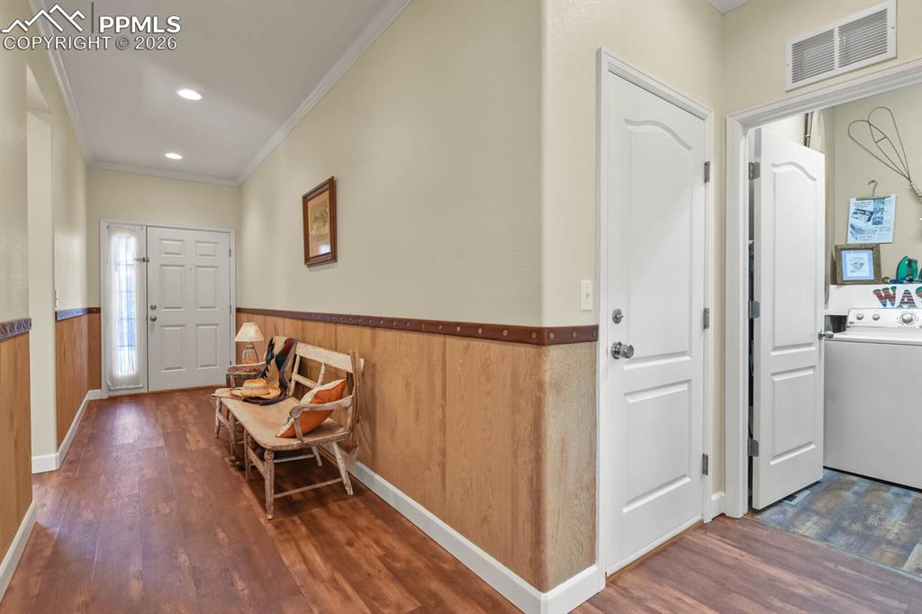 Image 5 of 43: LVP throughout traffic & all wet areas. Main Level Laundry!