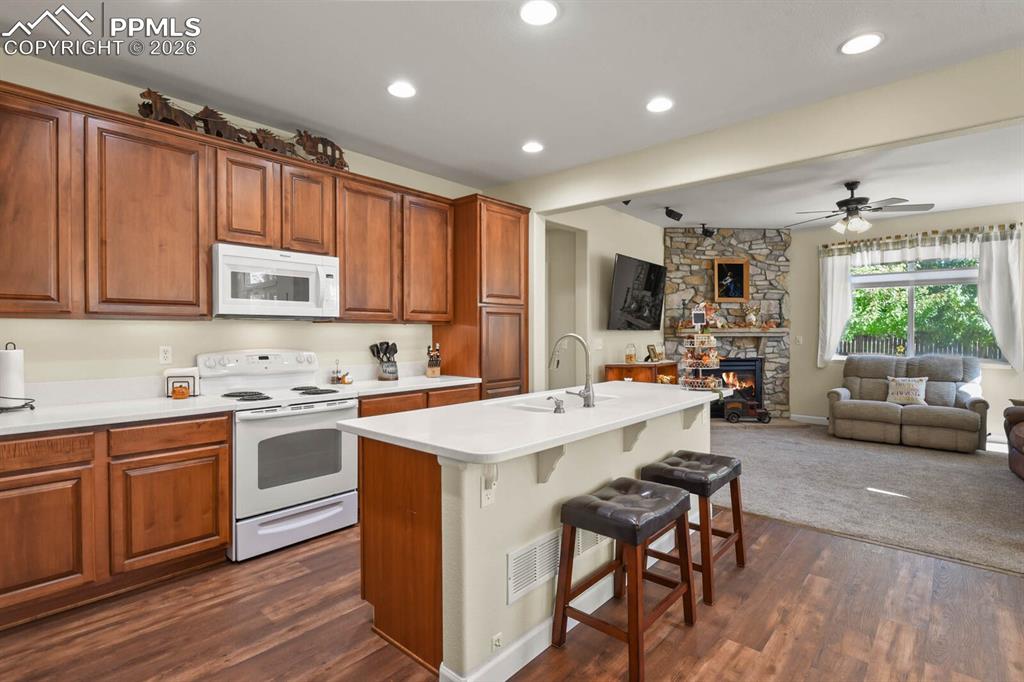 Image 8 of 43: LVP throughout traffic & all wet areas. New Carpet!