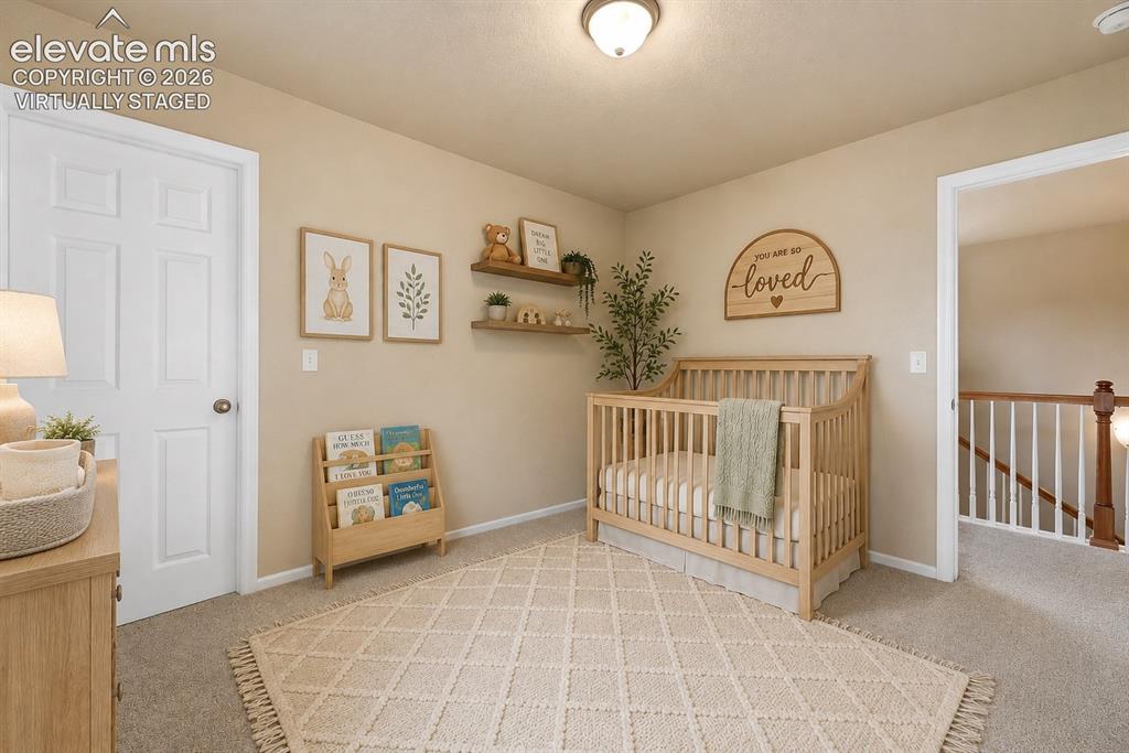 Image 15 of 33: *Virtually Staged*
Carpeted room with a ceiling-mounted light fixture