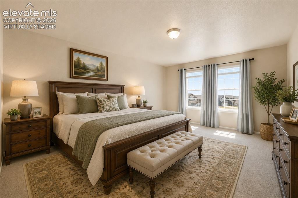 Image 17 of 33: *Virtually Staged*
Carpeted flooring, two pane windows, flush mount ceilin