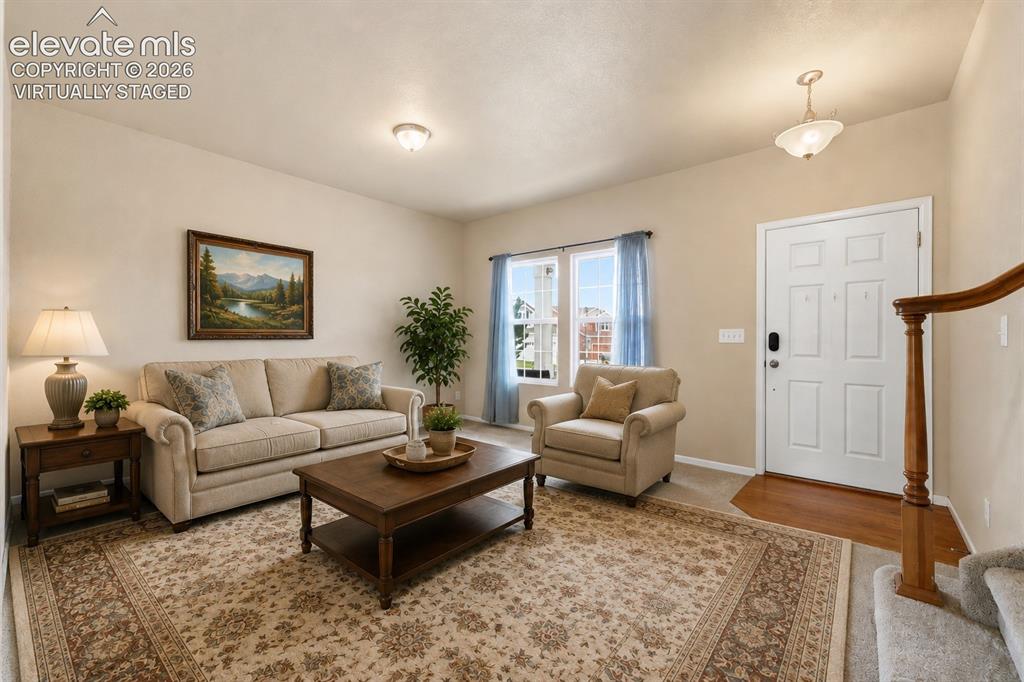 Image 3 of 33: *Virtually Staged
Spacious living area featuring neutral wall tones, a fro