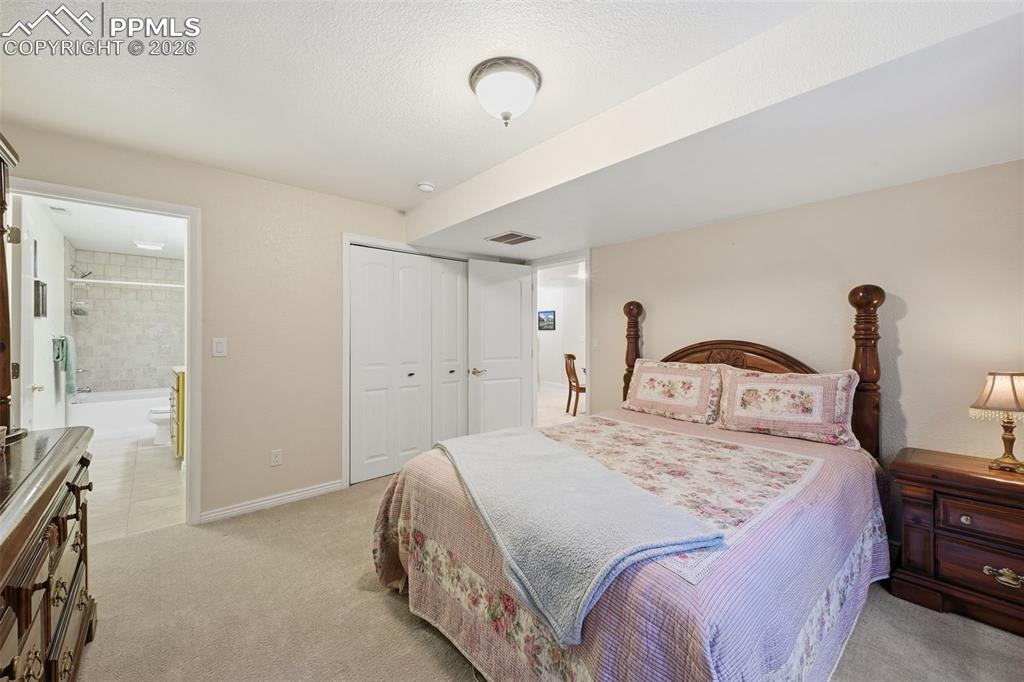 Image 22 of 38: Bedroom