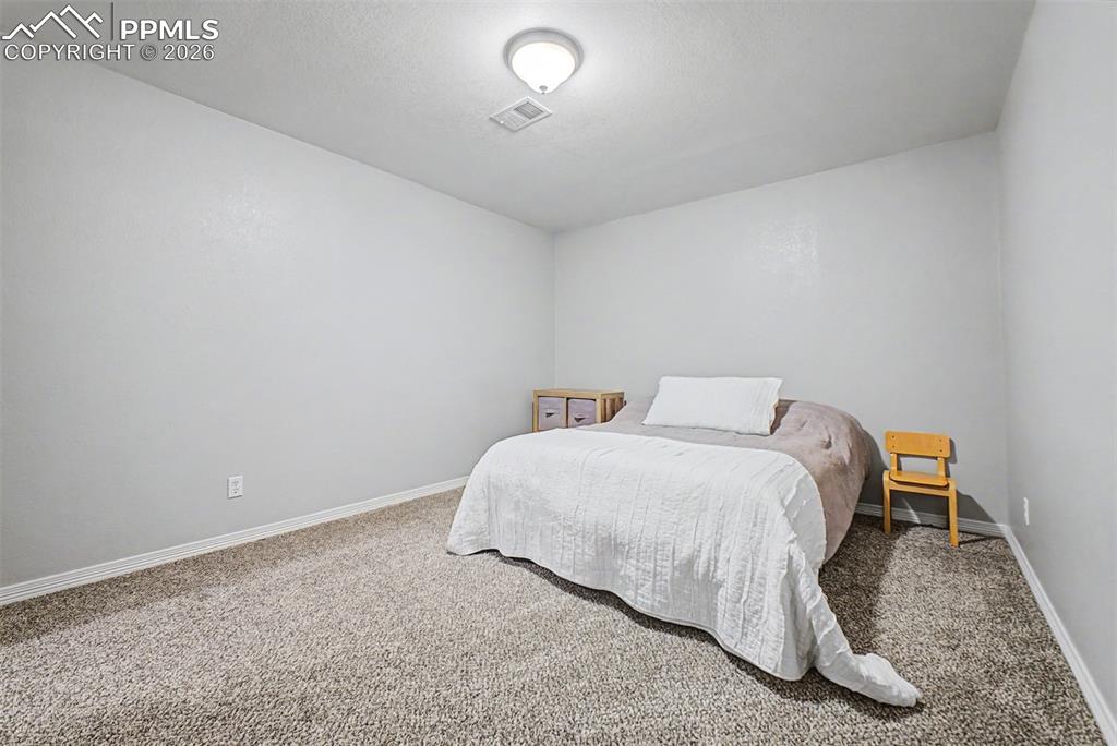 Image 21 of 48: Bedroom