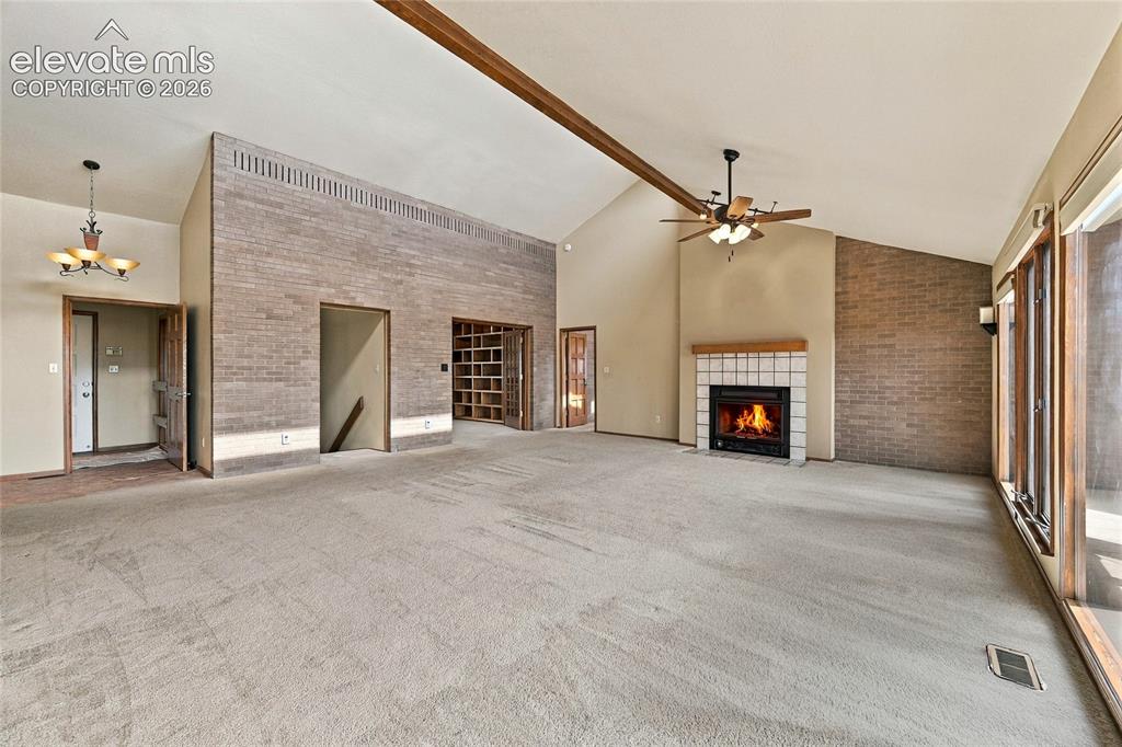 Image 6 of 50: living room with fireplace
