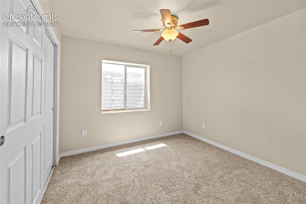 Image 33 of 44: basement bedroom