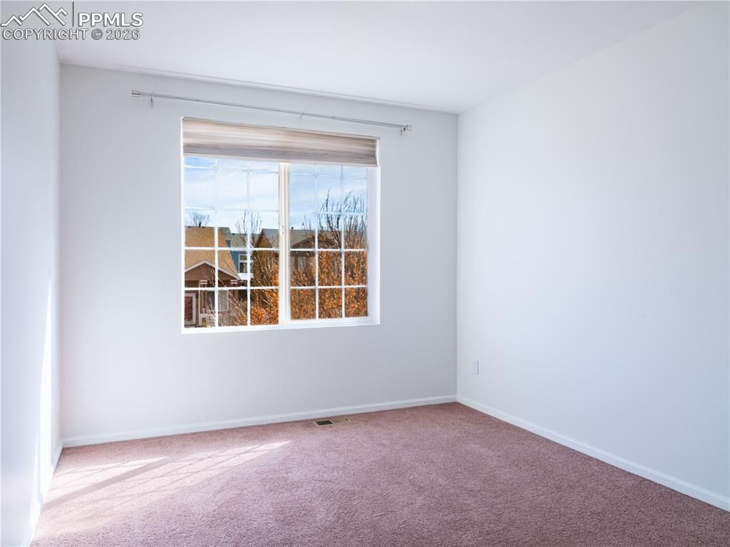 Image 22 of 28: Bedroom