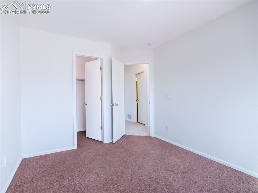 Image 23 of 28: Bedroom