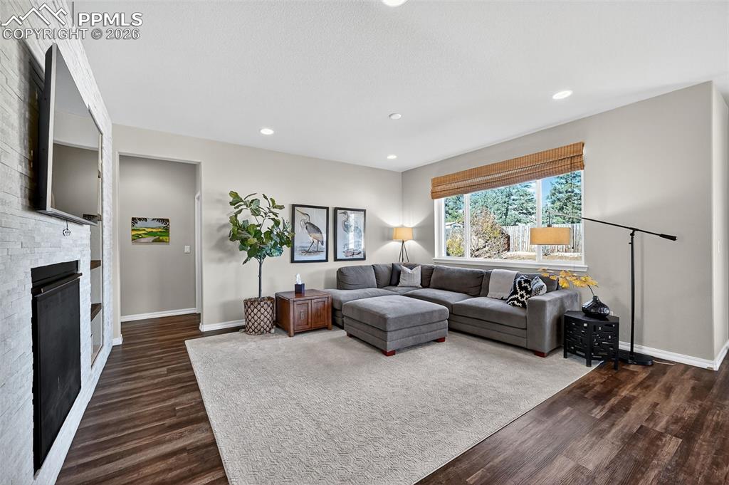 Image 9 of 32: ope and inviting great room