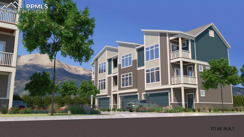 Caption: View of building exterior with a mountain view