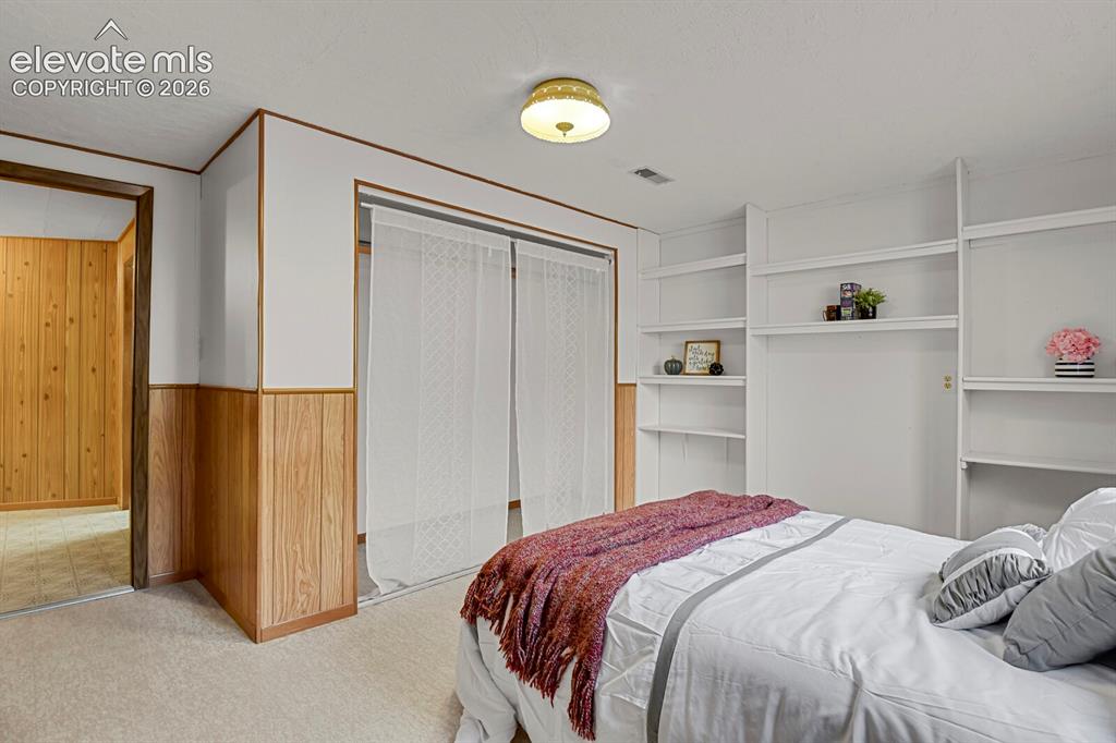 Image 34 of 48: Basement Bedroom