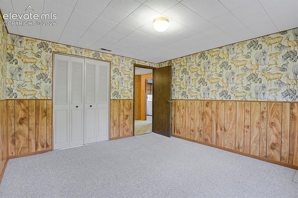 Image 37 of 48: Basement Bedroom